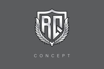 RQ Creative Initial Letter Logo with Shield and Laurel Wreath Silver Metallic Branding Emblem on Gray Background.