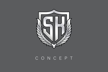 SK Creative Initial Letter Logo with Shield and Laurel Wreath Silver Metallic Branding Emblem on Gray Background.
