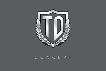 TD Creative Initial Letter Logo with Shield and Laurel Wreath Silver Metallic Branding Emblem on Gray Background.
