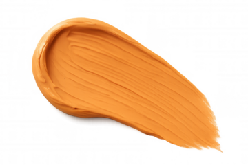 Smear of orange foundation makeup cream with transparent background, perfect for beauty and cosmetics projects