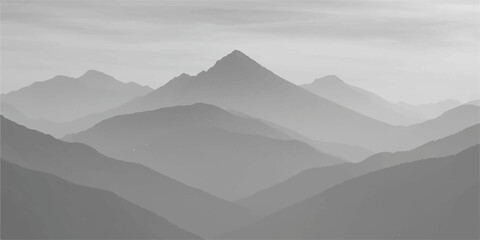 A beautiful mountain landscape with clouds and mist in the morning