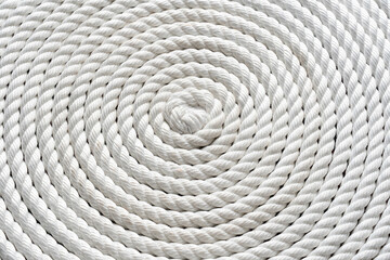 Fototapeta premium Macro rope background, of a thick rope in shape of a spiral,Photo of an vintage rope.