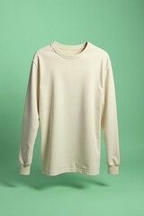 Plain White Crewneck Sweatshirt Hanging in Green Studio Background