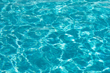 Blue ripped water in swimming pool, water pool texture and surface water backgraund.