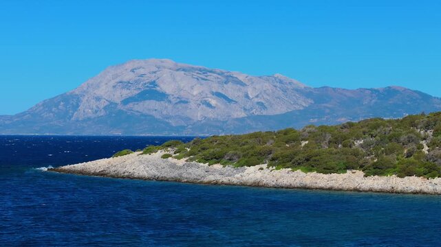 Drone aerial perspective from Samiopoula Beach showcasing the majestic Mount Kerkis of Samos, Greece