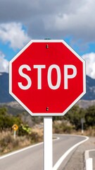 Octagonal red stop sign on a road