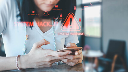 A woman holds a mobile device displaying a critical system hack warning. Glowing red alert icons signify a cybersecurity threat, indicating a severe data breach and digital security risk.