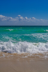 Sea waves background. Summer tourism. Ocean water motion. Ocean splash wave background. Deep blue sea beach. Turquoise wave. Dreamy exotic sea beach. Beautiful sea beach waves.