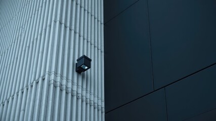 Architectural Exterior Detail Showcasing a Modern Building Facade with a Contemporary Wall Light Fixture