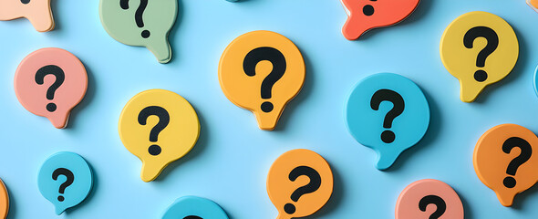 Group of white speech bubbles with question marks on blue background, communication concept representing confusion, inquiry, curiosity, support, and problem-solving ideas.