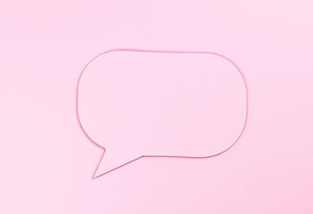 Delicate pink paper cut dot background with a speech bubble, handmade texture,   dot pattern,   cute