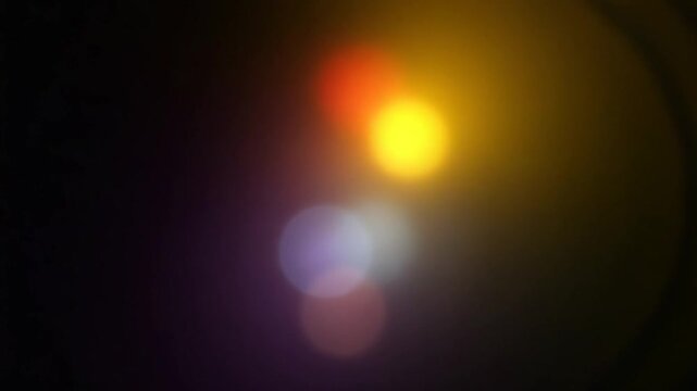 Multicolored light leaks 4k footage on black background, Stylizing , transitions, Bokeh effect