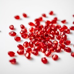 pomegranate seeds on white background