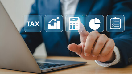 Tax planning with finance charts and calculator online with laptop