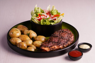 Grilled Steak with Baby Potatoes and Salad