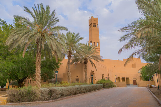 Ancient mudbrick fortress walls of Diriyah in Riyadh, Saudi Arabia, iconic Najdi heritage architecture under clear sky in Middle East.
