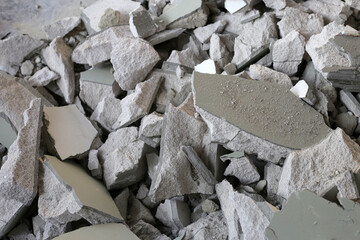 Broken concrete, Piles of lightweight construction bricks after house demolition
