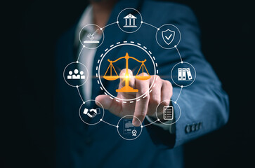 Legal Professional with Justice Icons. A suited legal professional touches virtual icons...