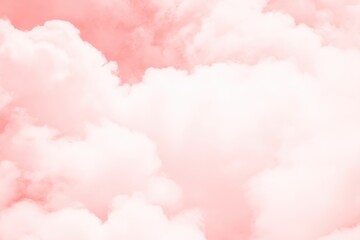 Soft, pink-hued clouds fill the frame, creating a dreamy, ethereal atmosphere