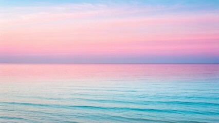 Serene ocean horizon with pastel pink and blue sky at sunrise or sunset water