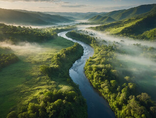 Aerial view of winding river cutting through lush green valley, soft morning mist clinging to ridges, sunlight striking water surface with cinematic glow, natural landscape stretching