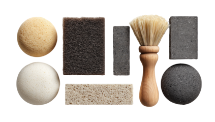 Assorted cleaning sponges and brush.  Top-down view of various textured cleaning items, including round and rectangular sponges, and a wooden-handled brush.  Natural materials and colors