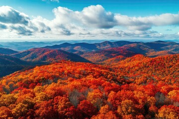 Autumn Foliage Over Rolling Mountain Ranges with Cloudy Sky
