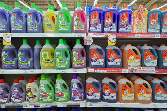 Penang, Malaysia &ndash; Aug 8, 2025: Assorted floor cleaning products including Dettol, Mr Muscle, Daia, and Bilo displayed on a supermarket shelf in Malaysia.