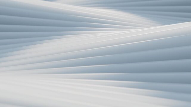 Abstract image of undulating white surfaces with subtle shadows creating a sense of depth and movement.