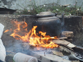 Ancient cooking tools, traditional, firewood at outdoor.