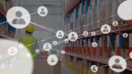 Animation of network of connections over caucasian warehouse worker - Powered by Adobe