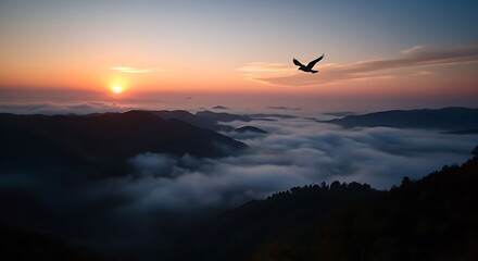 A majestic bird soaring freely through the golden sky during a breathtaking sunrise over a sea of clouds in the mountains