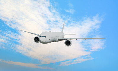 White passenger airplane flying in the sky amazing clouds in the background - Travel by air transport