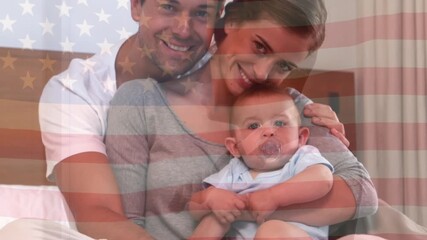 Animation of flag of usa waving over happy caucasin parents hugging baby