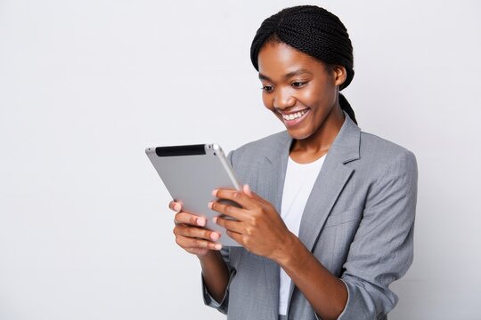 Smiling african american woman using tablet for business communication online meeting