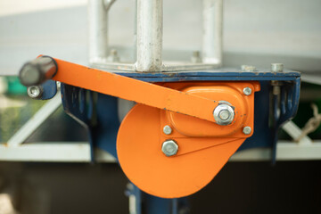 Winch for lifting the stage. Cable winding mechanism. Attachment to the structure.