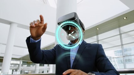 Animation of clock over african american businessman wearing vr headset - Powered by Adobe