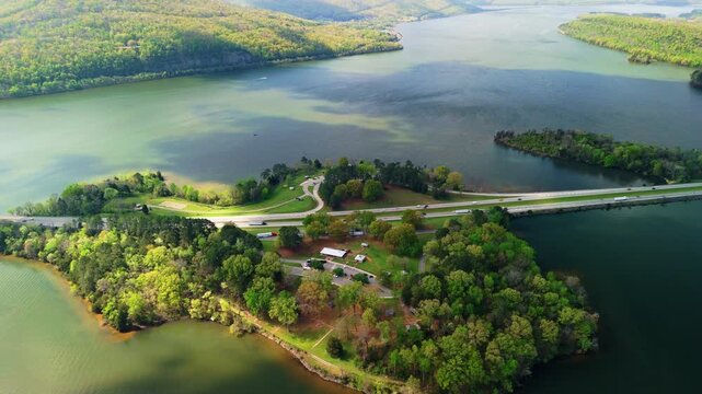 An aerial view of highway crossing the Tennessee River with island on the middle, Marion County Park near Chattanooga on a sunny day in Tennessee, USA