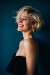 Beauty model woman short blonde hair and wearing black cloth for Hairstyle design and salon shop concept.