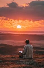 Writer creating story outdoors during beautiful sunset over hills