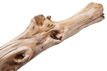 A close up of a light colored weathered wooden log with knots and holes against a black