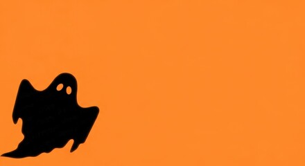 A spooky ghost silhouette on vibrant orange backdrop creates Halloween excitement