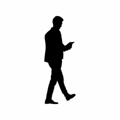 Silhouette of a businessman using a tablet to check smart city updates