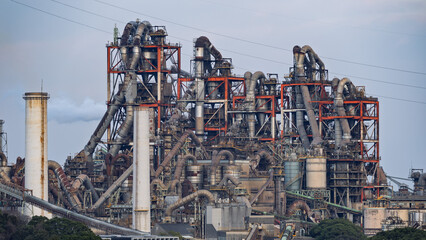 A cement plant with a complex network of pipes