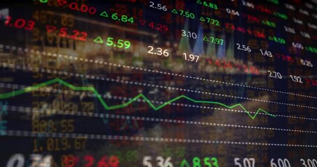 Composite video of stock market data processing against cityscape at night - Powered by Adobe