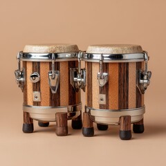 Close up view of a pair of small, vertical, wood and chrome tumbadoras on a tan background. 