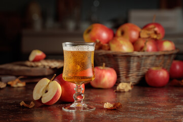 Apple cider on an old kitchen table.