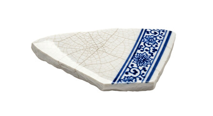 Historic porcelain fragment with intricate blue design and crackle glaze on transparent background