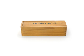 wooden box with the word “Domino” written on it, isolated on a clean white background