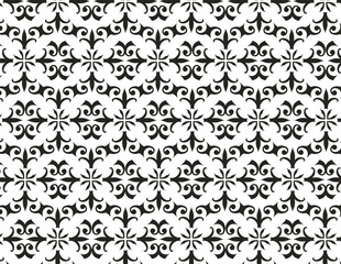 Obraz premium Bold black and white pattern with a repeating cross and swirling floral shapes.